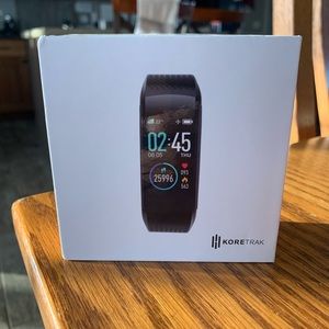 Koretrak watch with extra orange band